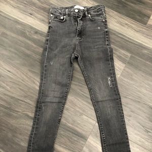 Grey distressed skinny jeans